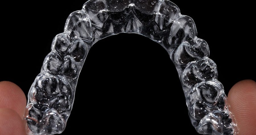 Invisalign costs $3,415 to $8,965 in 2026