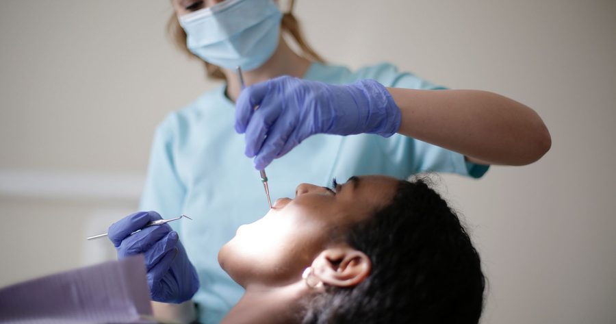 Tooth bonding costs $215 to $560 per tooth in 2026